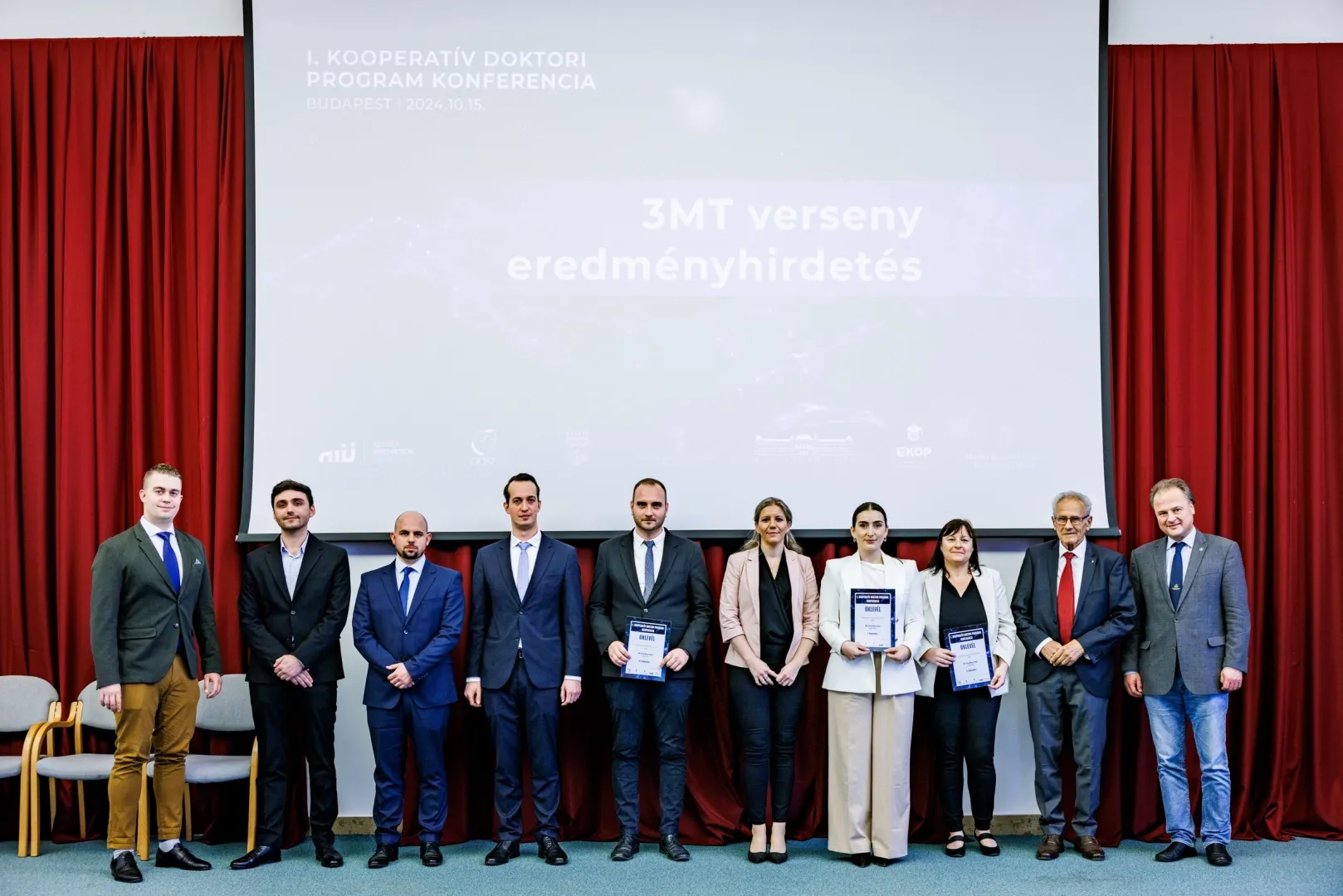 The top contestants in the 3MT competition, including Széchenyi István University doctoral students Dr. Domonkos Tinka (first from left) and Brúnó Péter (third from left).